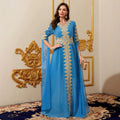 Robe longue bleue en mousseline et dentelle, manches trois-quarts