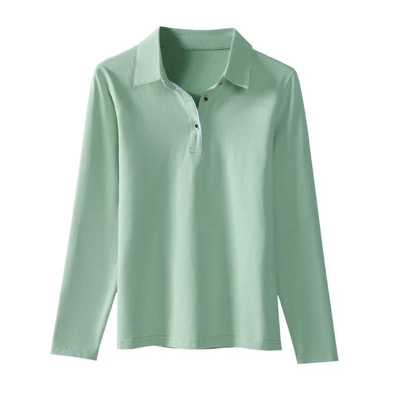 Polo femme uni à manches longues et col boutonné