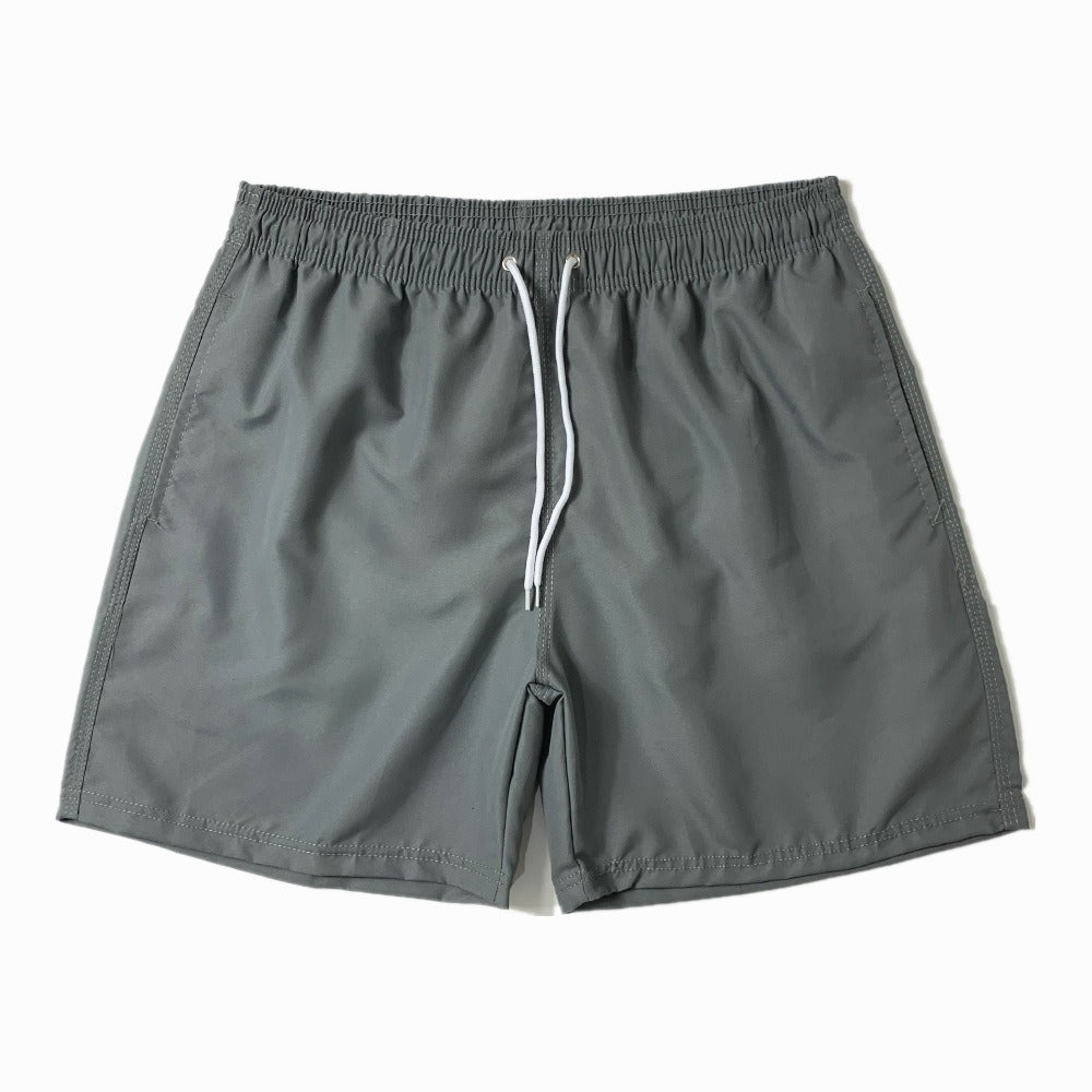 Short de plage homme uni à cordon de serrage