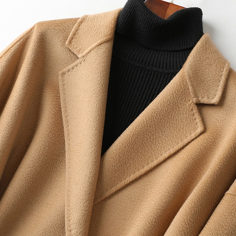 Manteau long femme à ceinture et col à revers