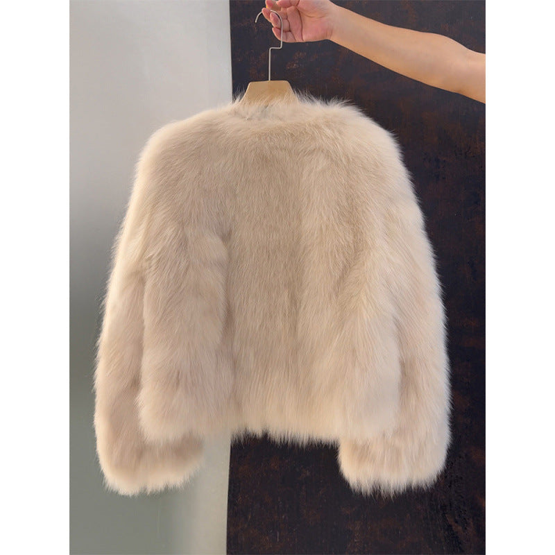 Veste courte femme aspect fourrure à boutons dorés