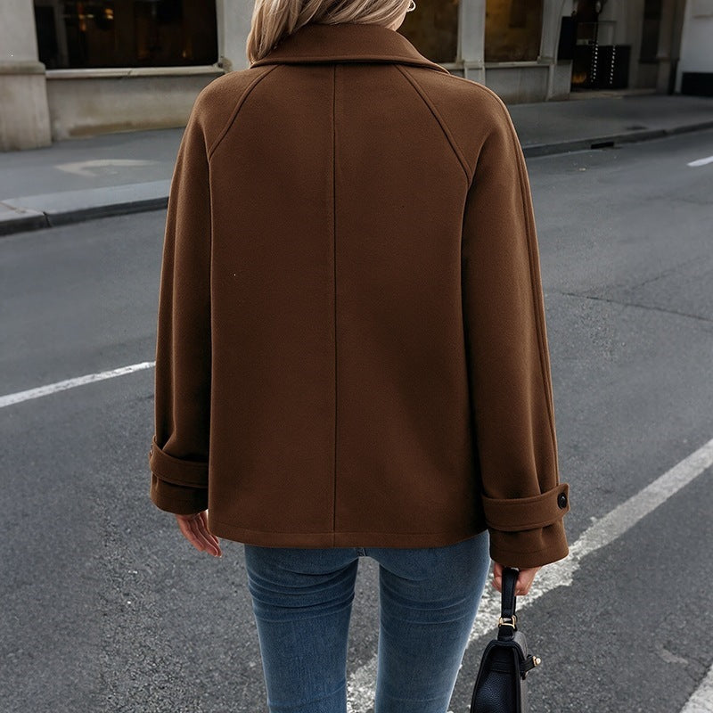 Veste mi-longue à col rabattu et boucle couleur unie femme