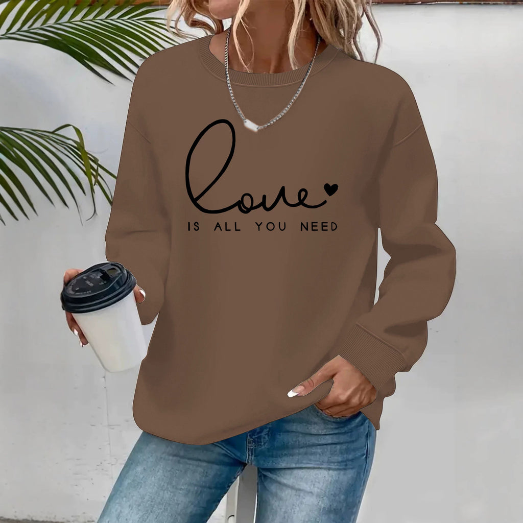 Sweat femme ample à col rond « Love is what you need »