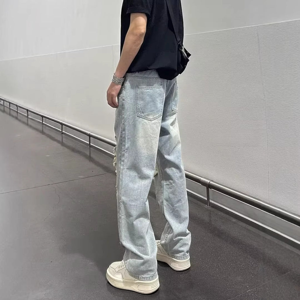 Jean homme déchiré bleu clair – Coupe droite