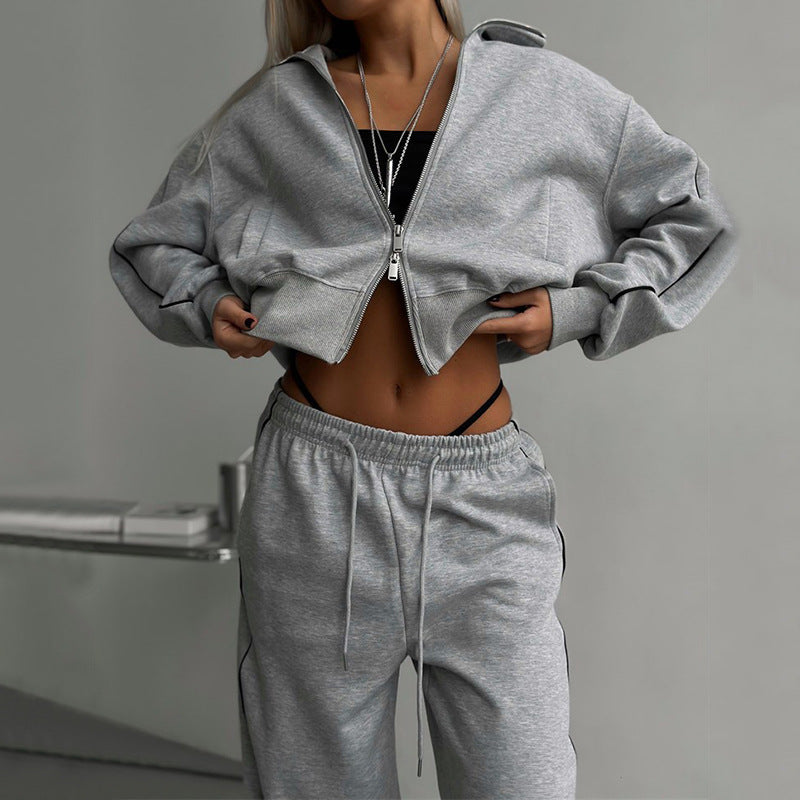 Zweiteiliges Damen-Set – Kapuzenjacke mit Reißverschluss und Hose mit Kordelzug