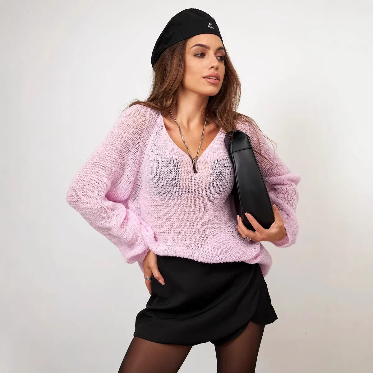 Einfarbiger Pullover mit Rundhalsausschnitt und Lochstrickmuster, lange Ärmel