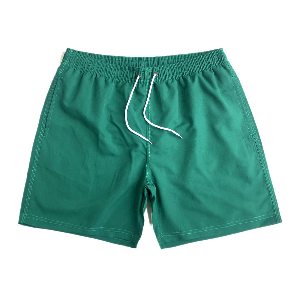 Short de plage homme uni à cordon de serrage