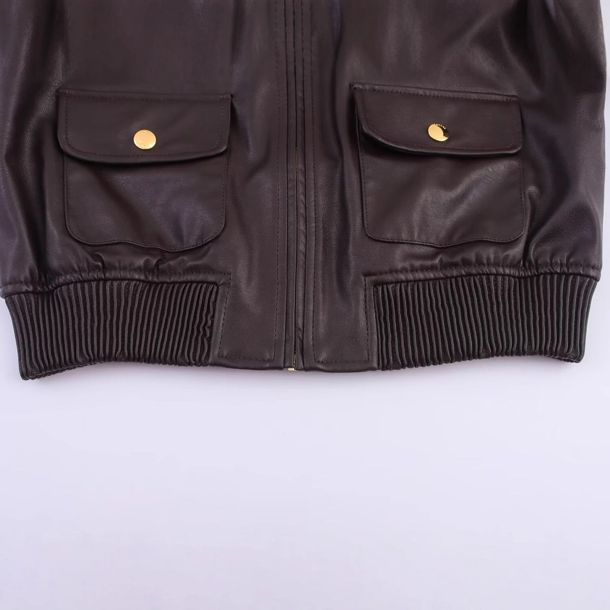 Blouson femme marron enduit à poches et détails dorés