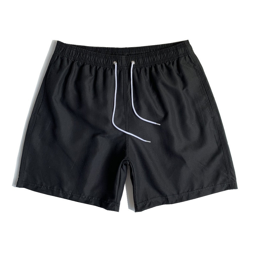 Short de plage homme uni à cordon de serrage