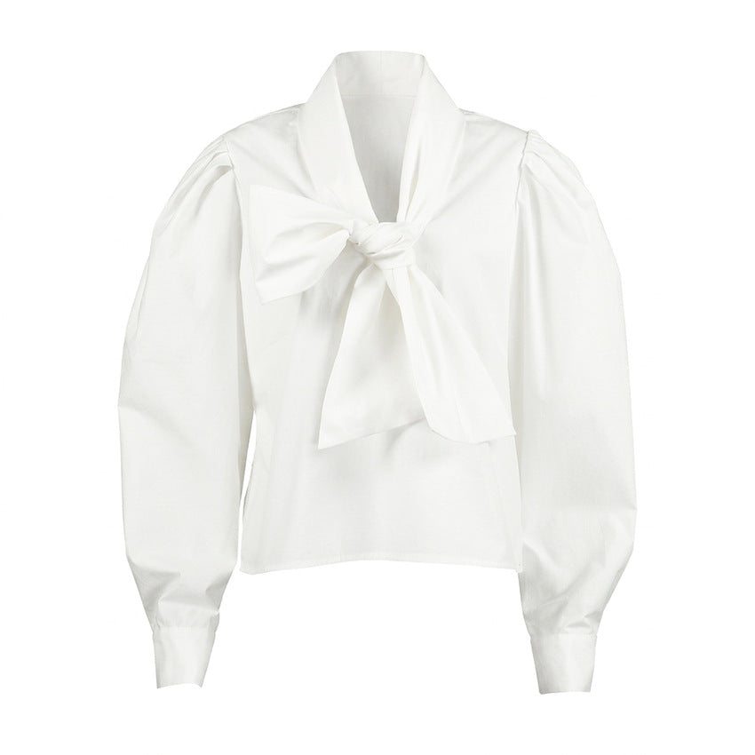 Blouse blanche en coton à grand nœud et manches bouffantes