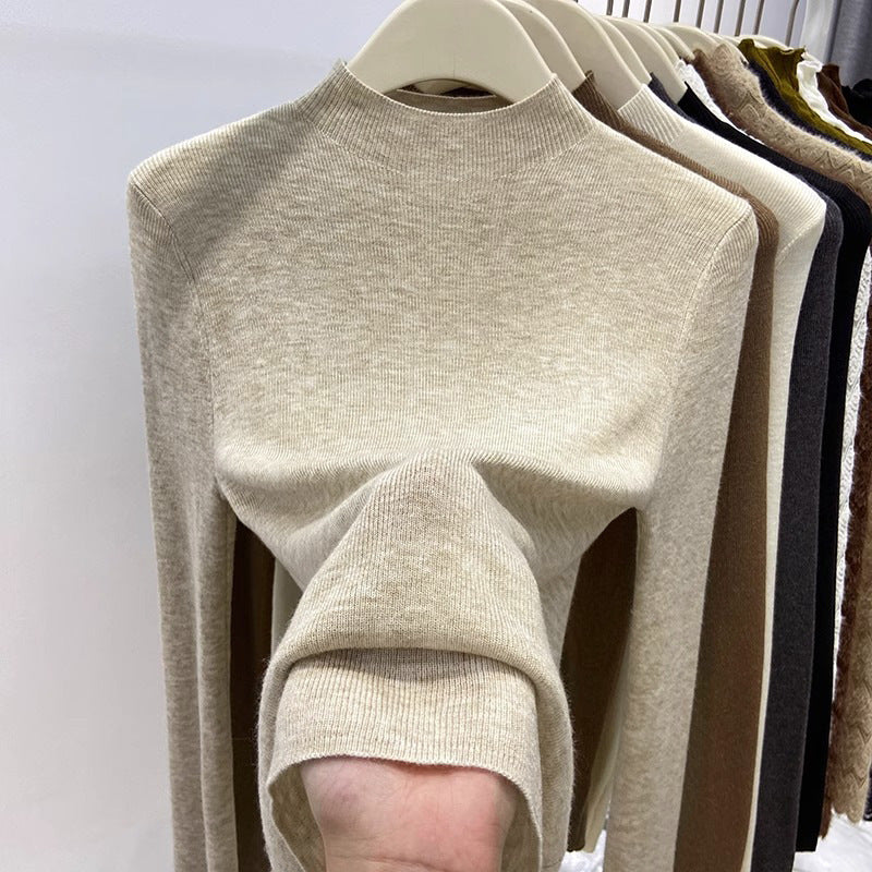 Pull femme en maille à col montant et manches longues