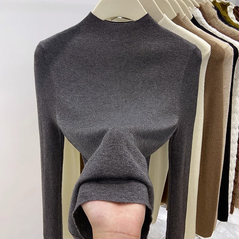Pull femme en maille à col montant et manches longues