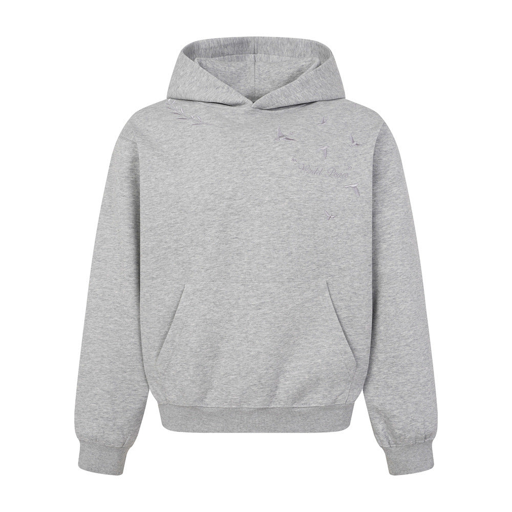 Sweat à capuche homme ample à oiseaux brodés