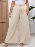 Pantalon large femme beige à cordon et boutons
