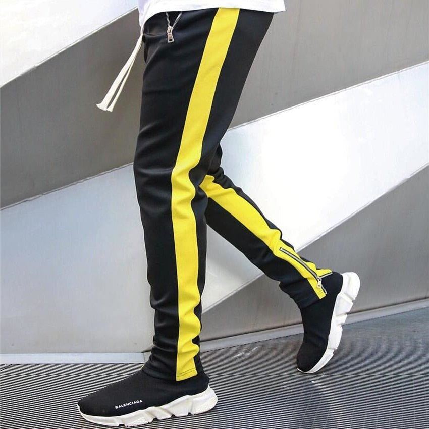 Jogging homme ajusté à bandes contrastantes et zips aux chevilles