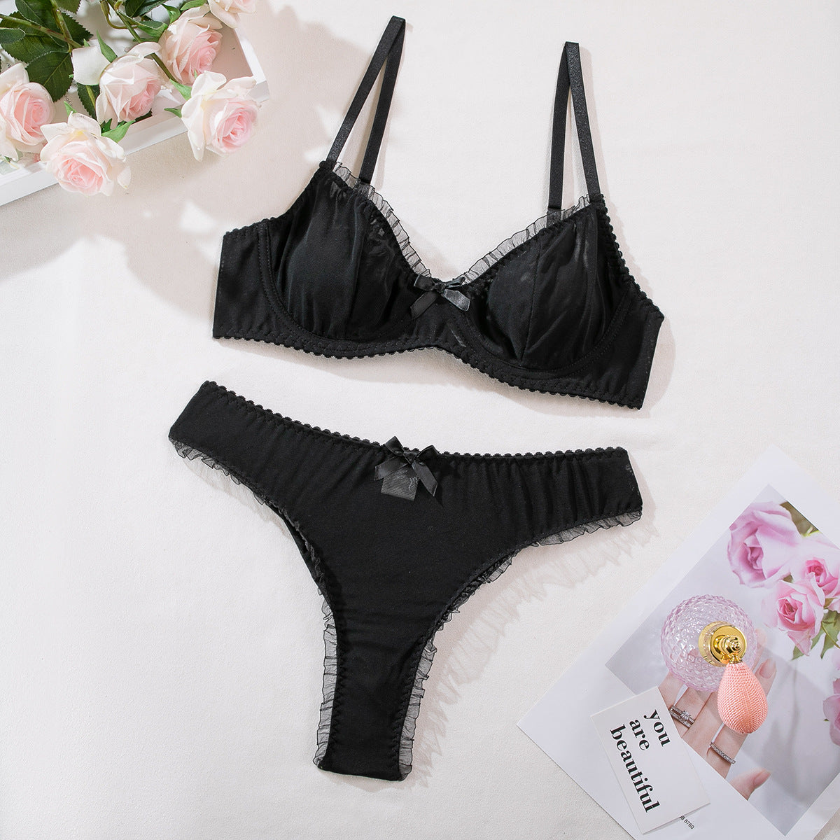 Ensemble lingerie femme en maille à petits nœuds