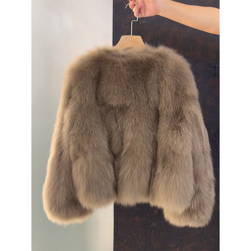 Veste courte femme aspect fourrure à boutons dorés