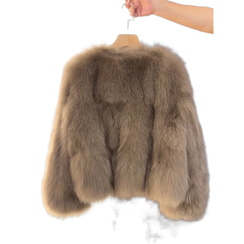 Veste courte femme aspect fourrure à boutons dorés