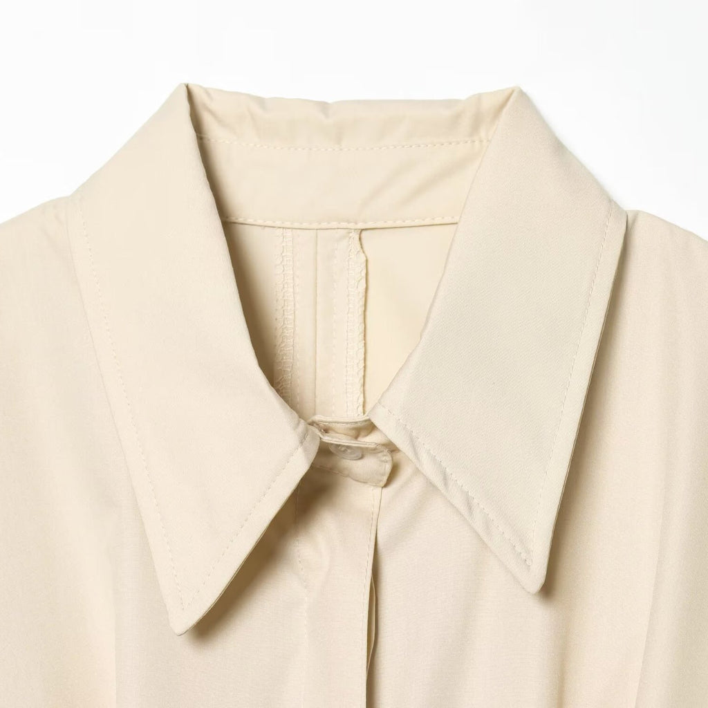 Blouse femme sans manches à col chemise et taille plissée