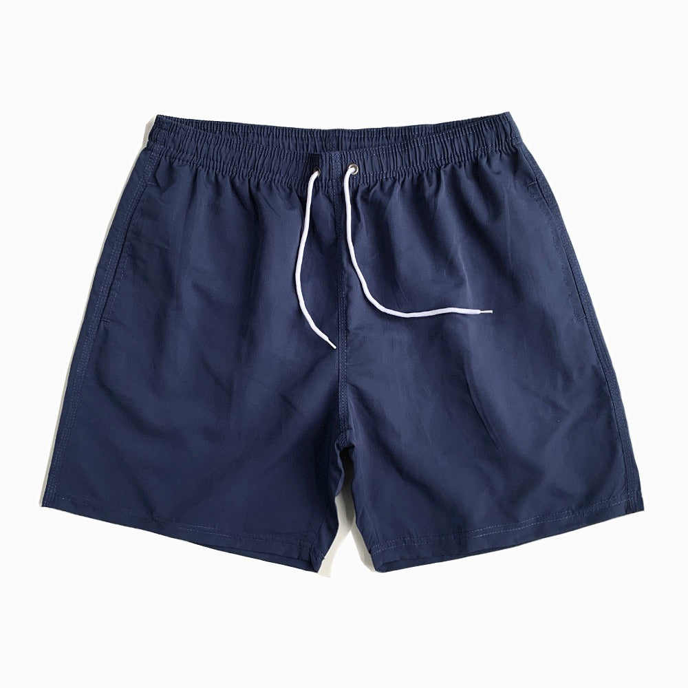 Short de plage homme uni à cordon de serrage