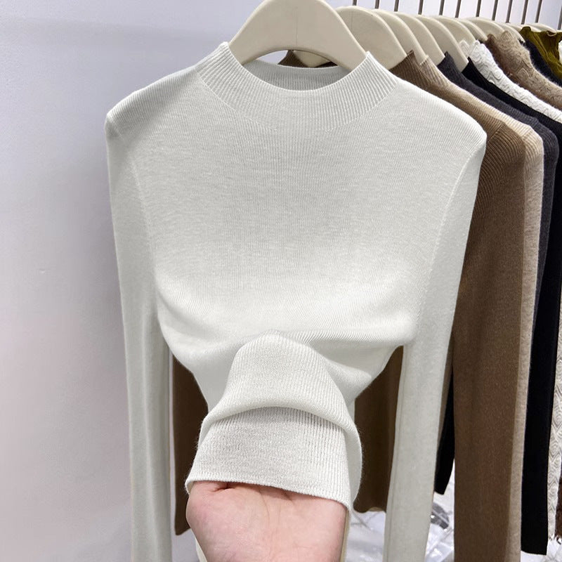 Pull femme en maille à col montant et manches longues