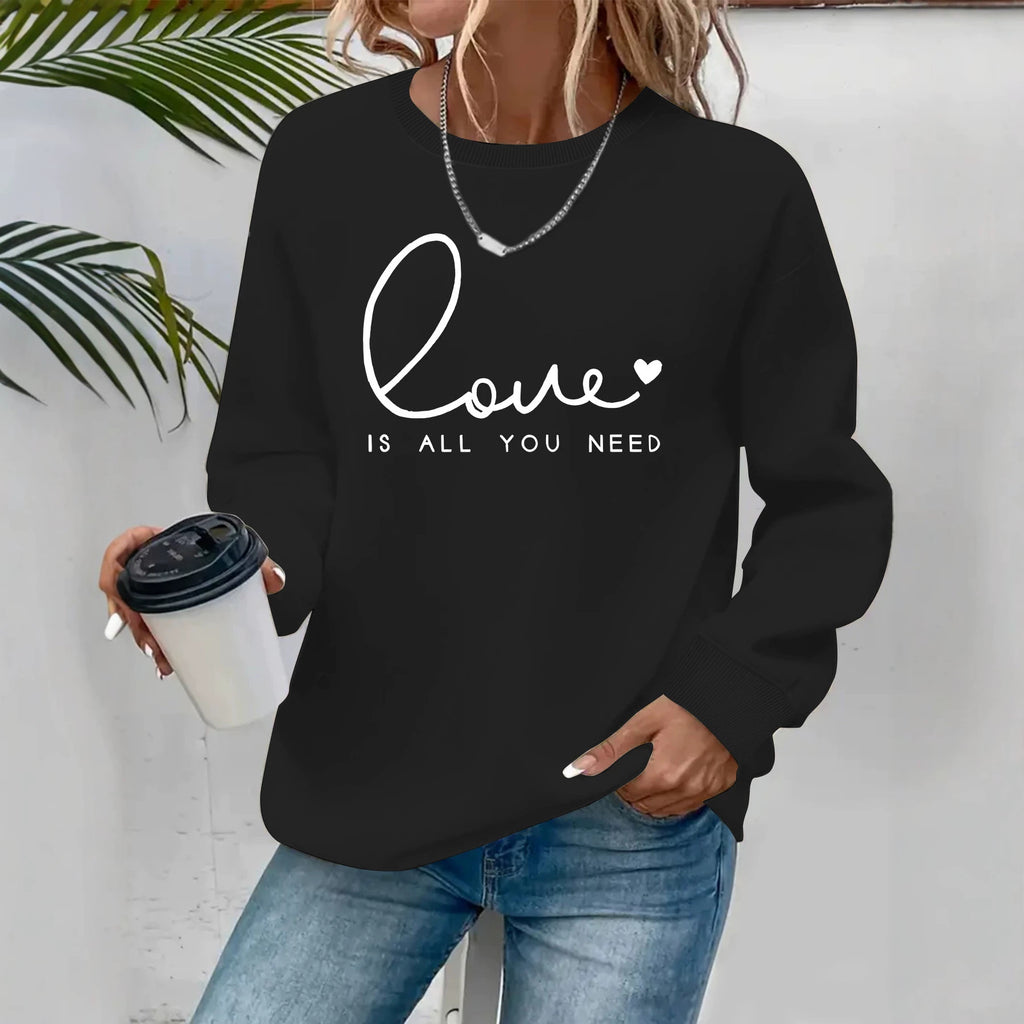Sweat femme ample à col rond « Love is what you need »