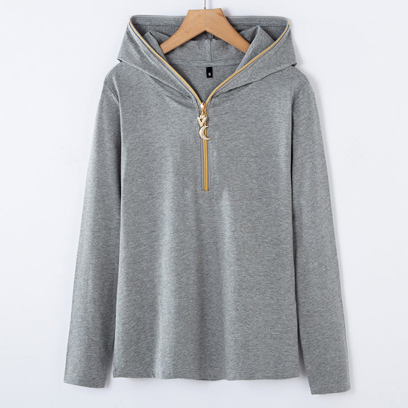 Haut femme à capuche et demi-zip doré