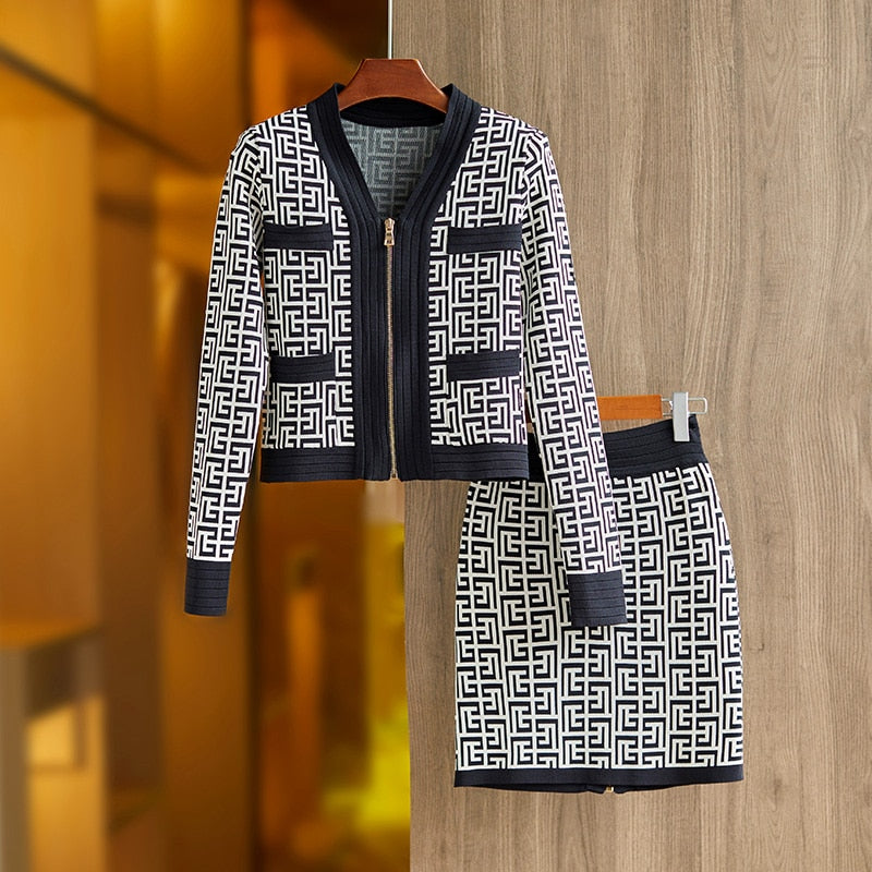 Ensemble femme veste zippée et jupe en maille à motifs noir et blanc