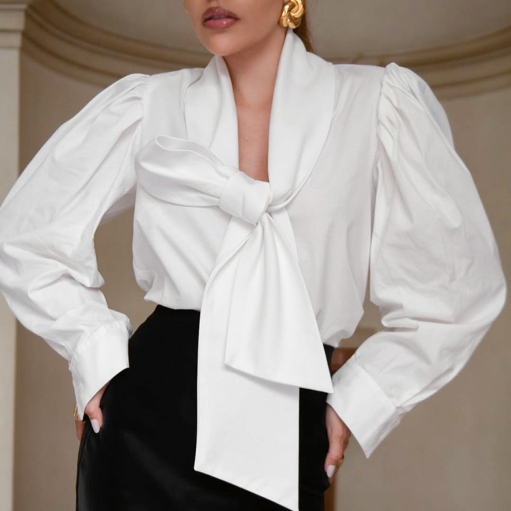 Blouse blanche en coton à grand nœud et manches bouffantes