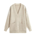 Cardigan femme ample en maille à col V et manches ornées
