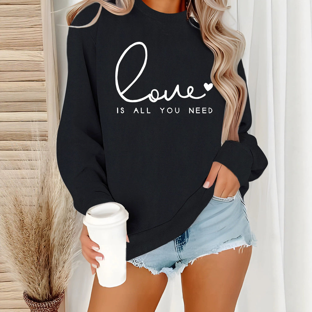 Sweat femme ample à col rond « Love is what you need »