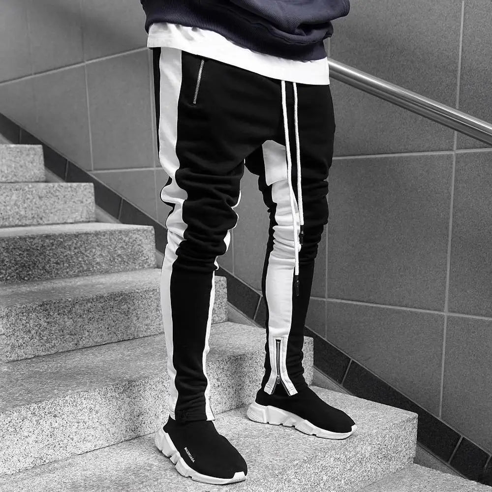 Jogging homme ajusté à bandes contrastantes et zips aux chevilles