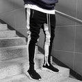 Jogging homme ajusté à bandes contrastantes et zips aux chevilles