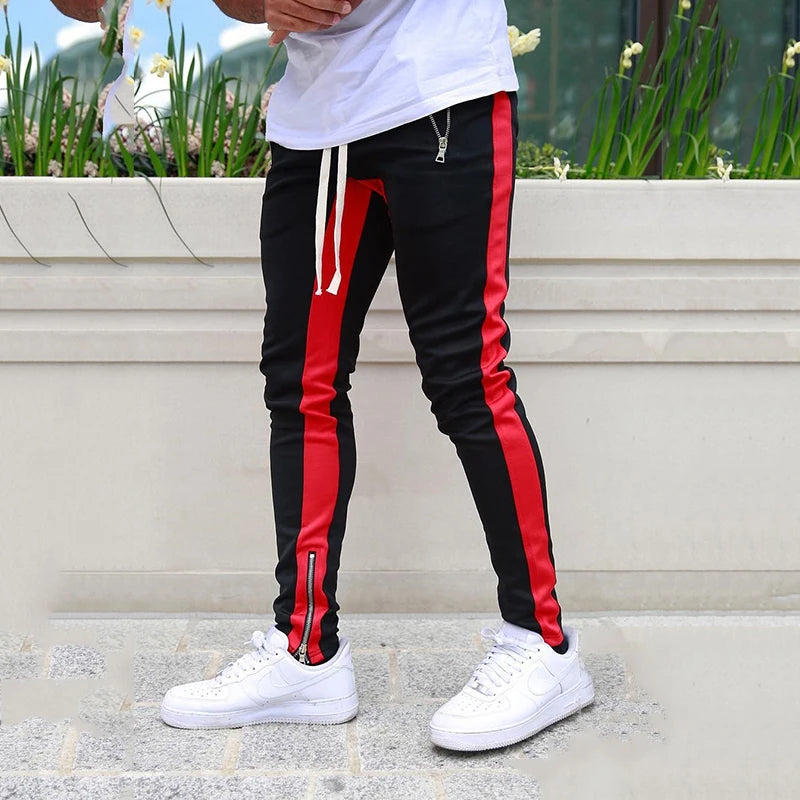 Jogging homme ajusté à bandes contrastantes et zips aux chevilles