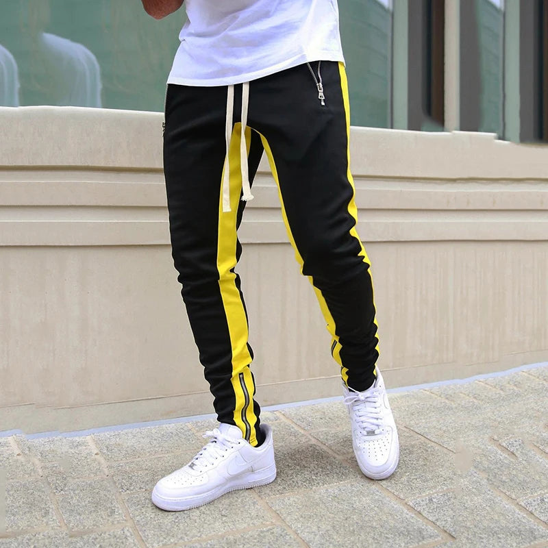 Jogging homme ajusté à bandes contrastantes et zips aux chevilles