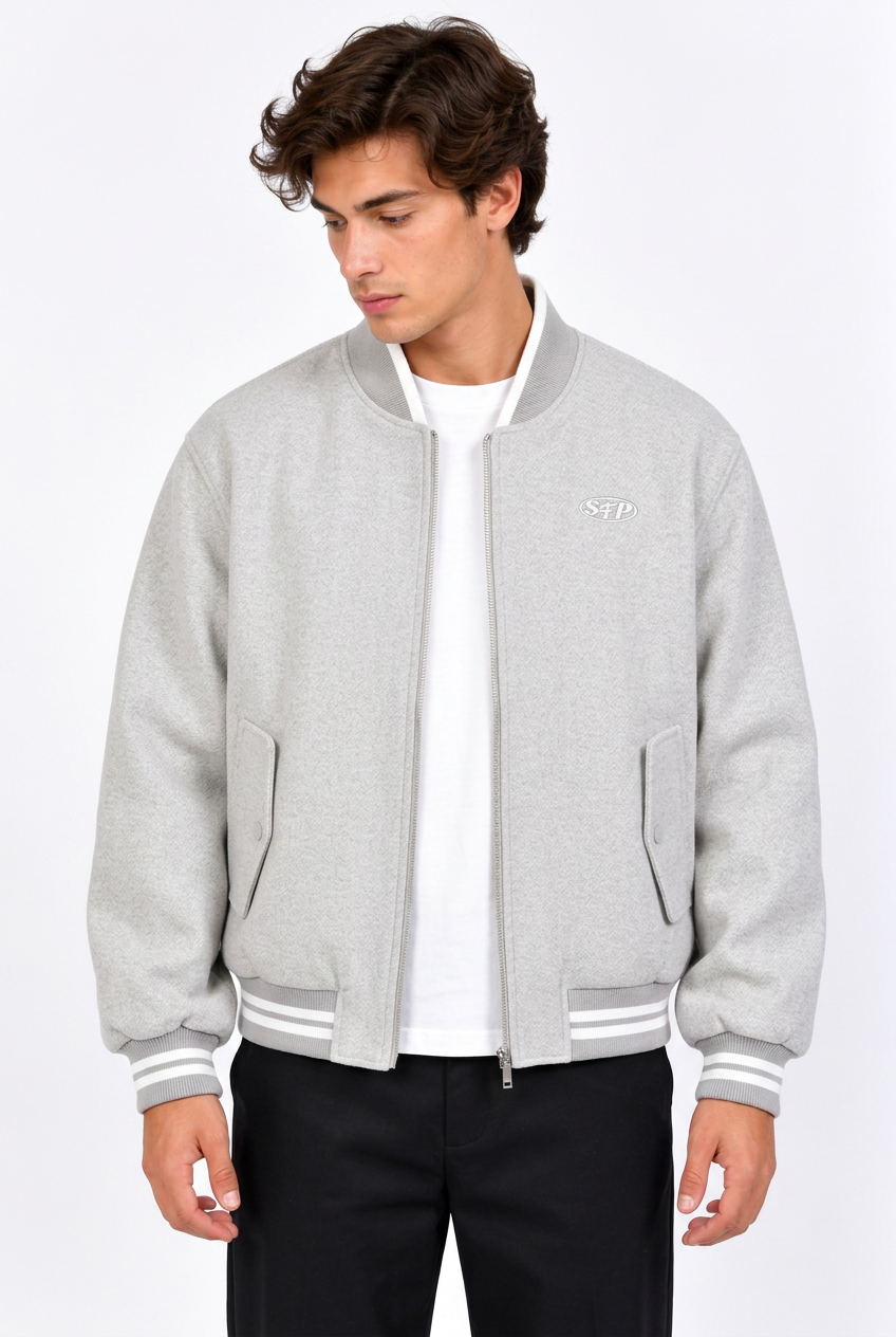 Jeff avec le blouson gris chiné
