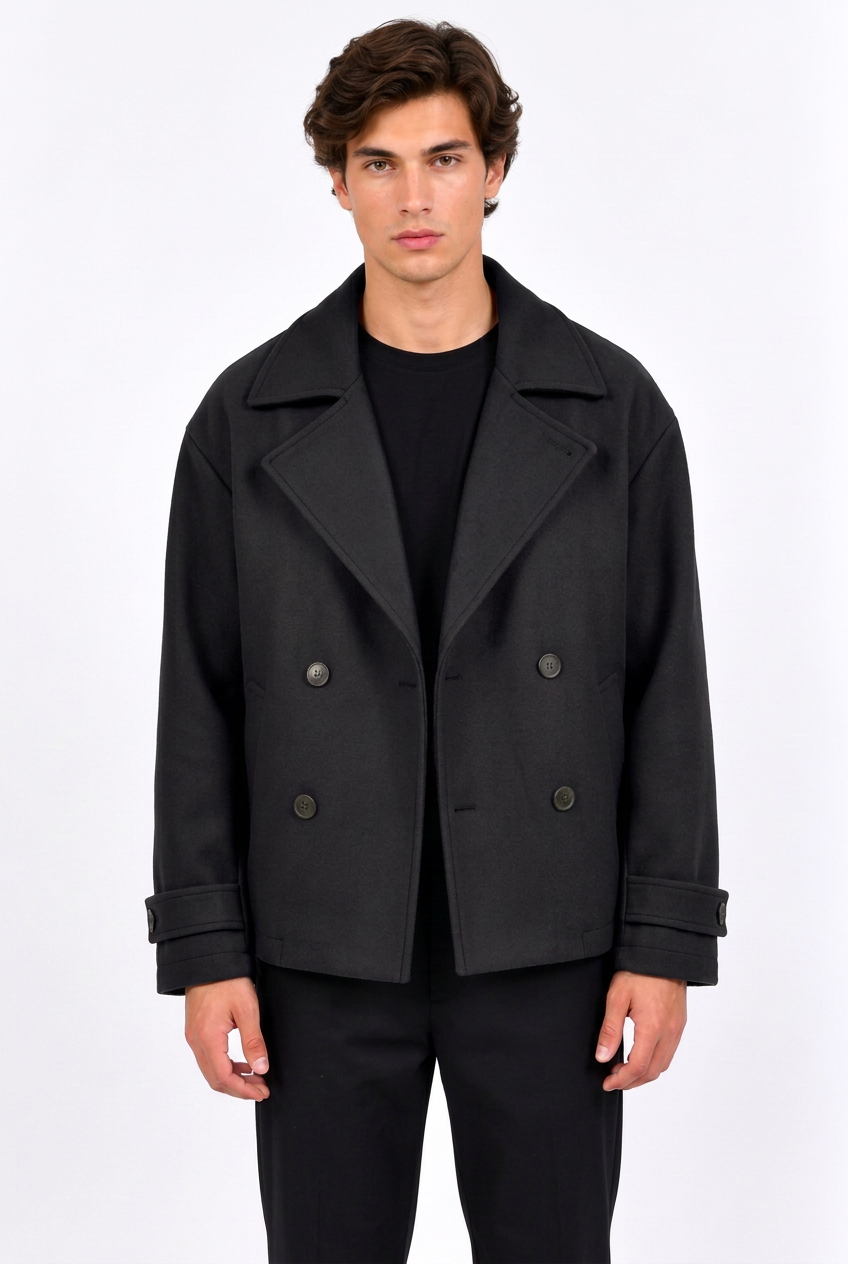 Manteau court noir porté par Jeff