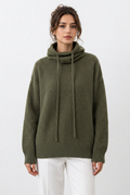 Stéphanie, pull vert plus long et plus ample